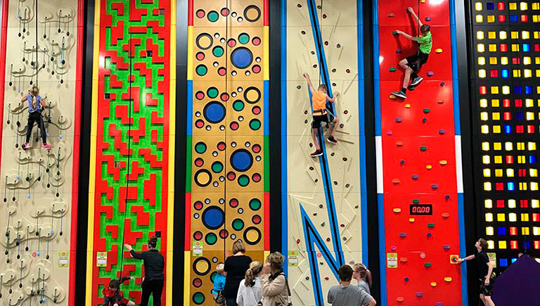 Boy On Climbing Wall