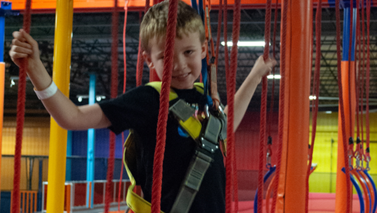Young Guest On Ropes Course